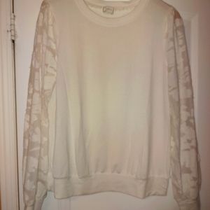White soft sweater with sheer lace sleeves
